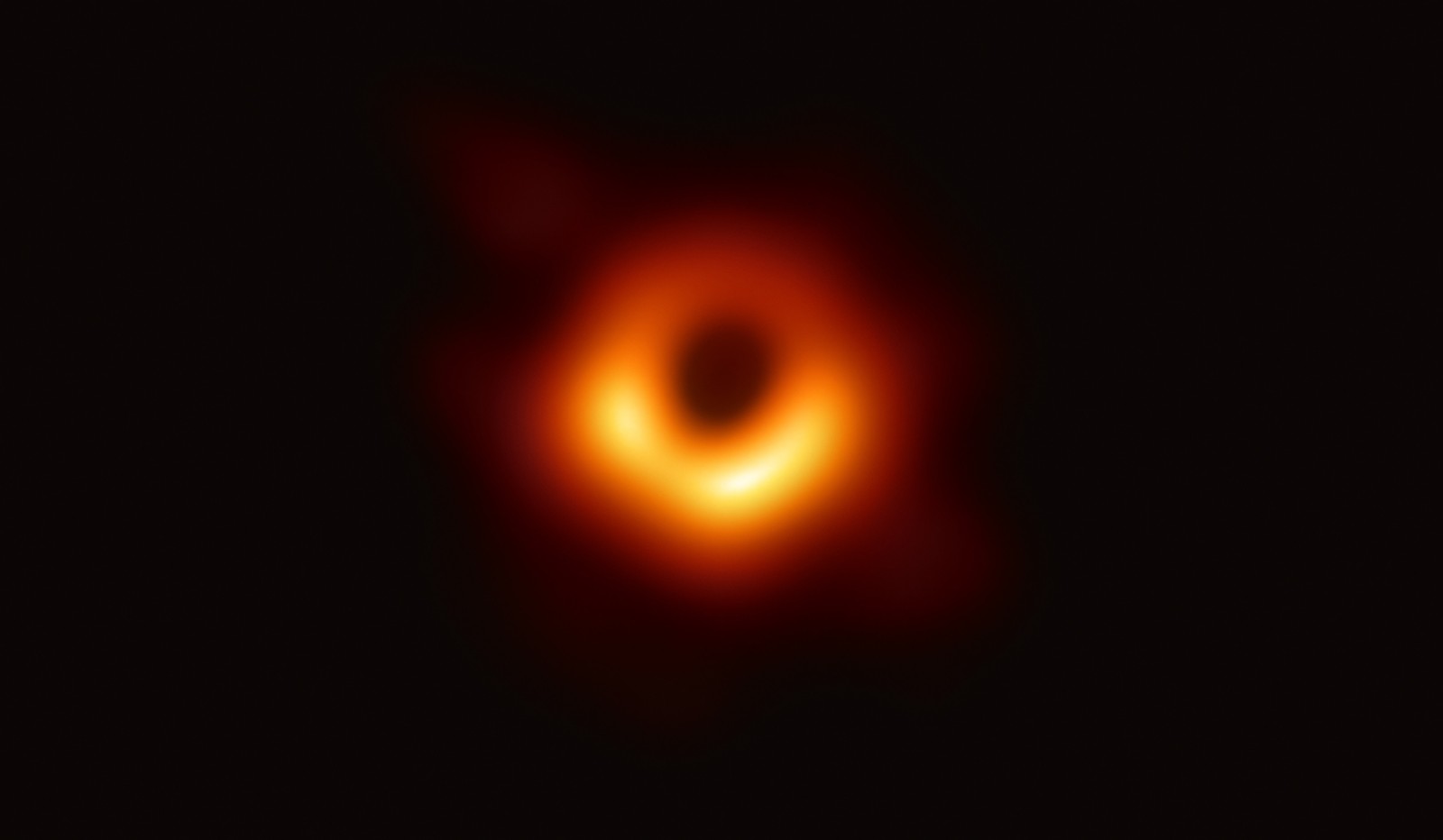 Event Horizon Telescope reconstruction of the shadow of the black hole in Messier 87, a bright asymmetric ring around darkness.