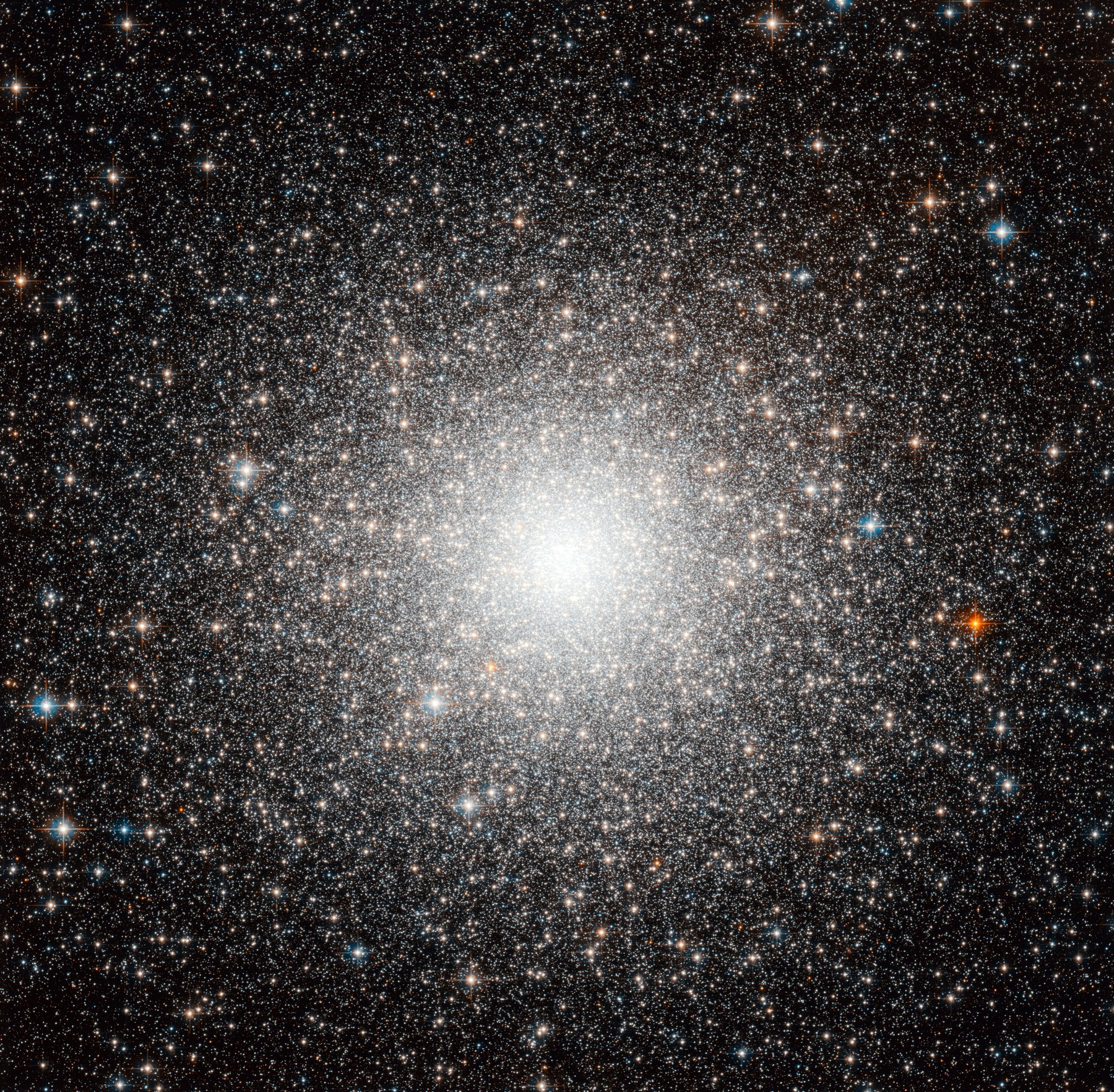 Hubble image of LRG 3-757, a nearly complete Einstein ring: a background galaxy lensed into a circle by a massive foreground galaxy.